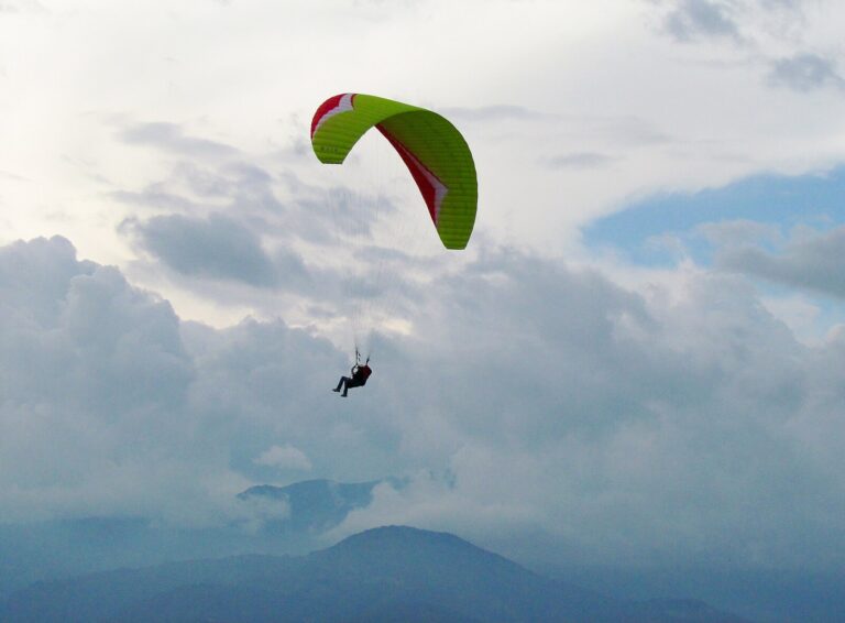 Paraglider flying above the Andean cloud near Merida, Venezuela